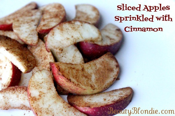 Apple Slices Sprinkled with Cinnamon for a quick and healthy afternoon snack