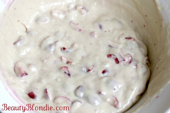 Folding in cranberries to your basic muffin batter