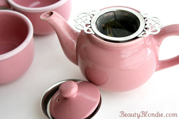 Having tea in a cute pink tea pot makes the herbal tea taste better.