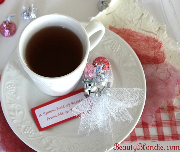 This is a Cute Valentine's day tea and a spoon full of kisses. 