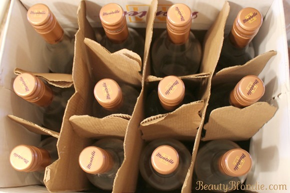 A whole box of empty wine bottles