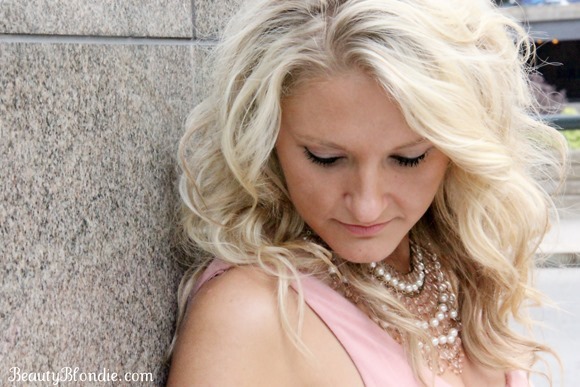 I love the accessories with this pale pick dress, the simple studs and a bold necklace