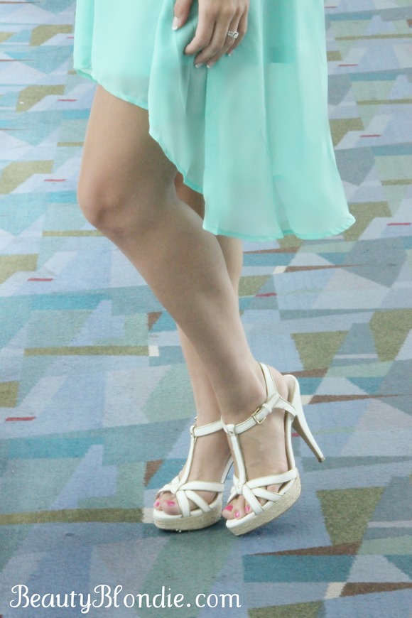 I love the white heals with this mint dress